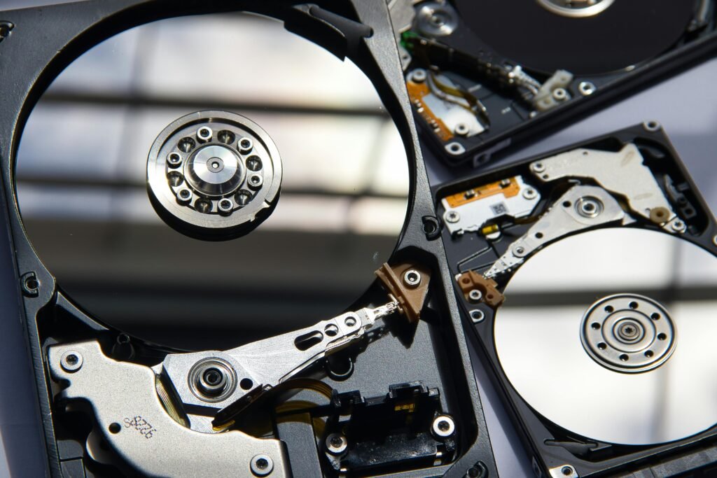 Detailed view of disassembled hard drives showcasing technology and hardware components.